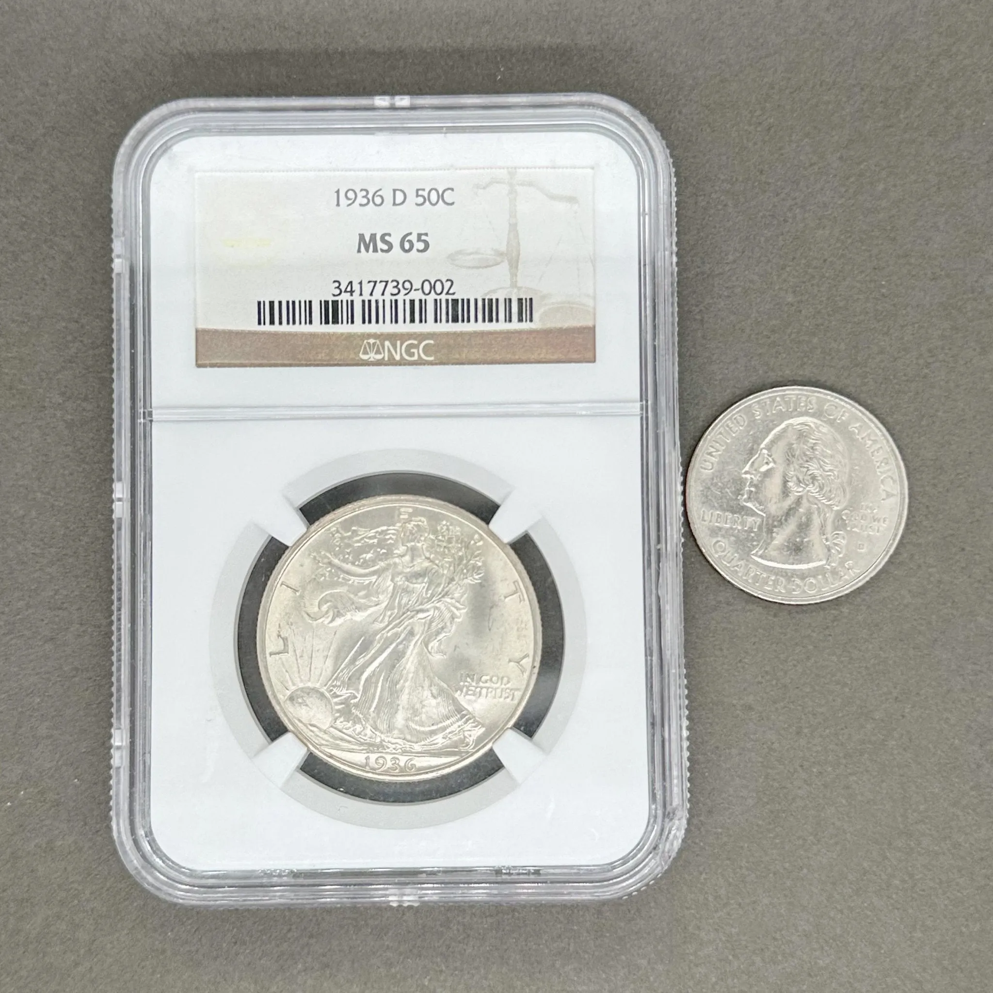 Estate 0.900 Fine Silver 1936 Walking Liberty $1 Coin NGC MS65