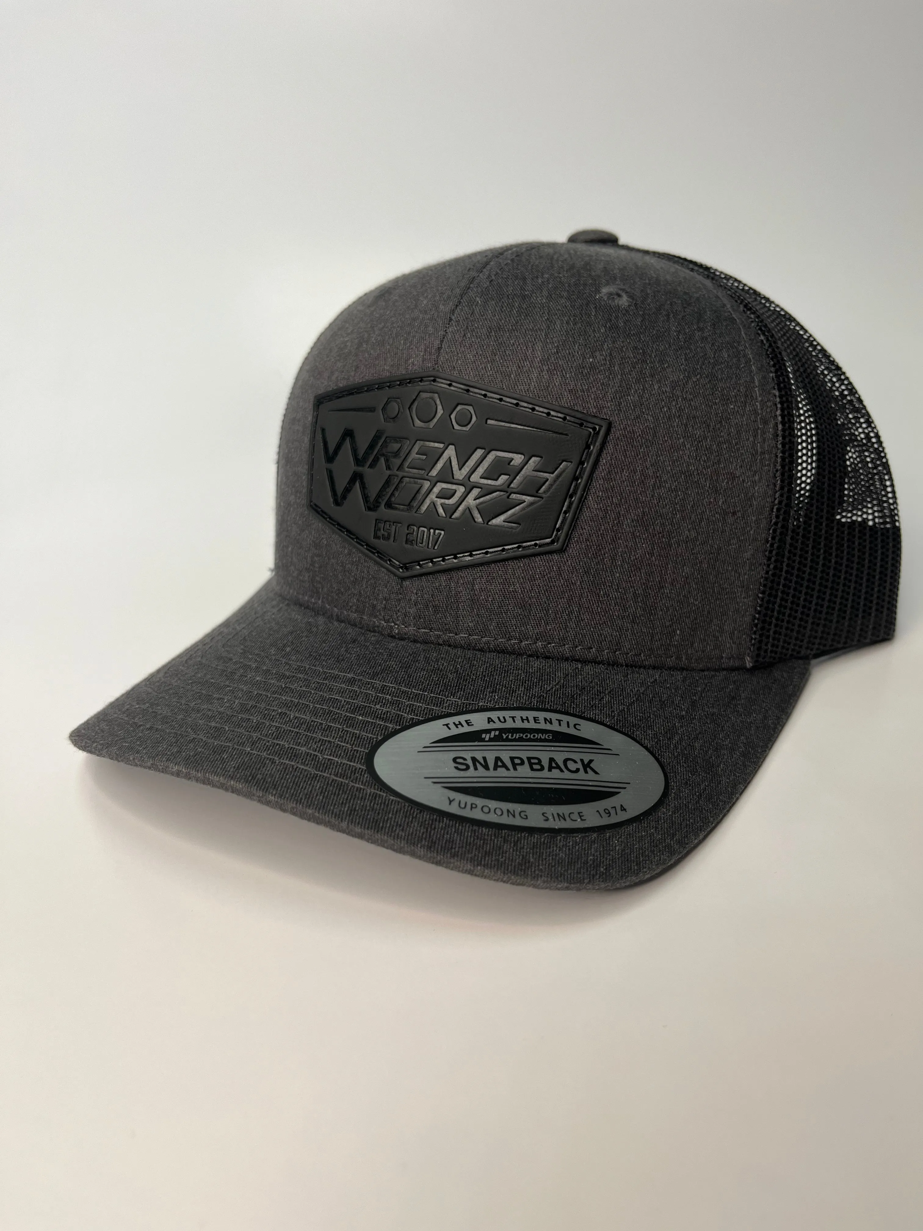 Leather Badge Snapback Hat