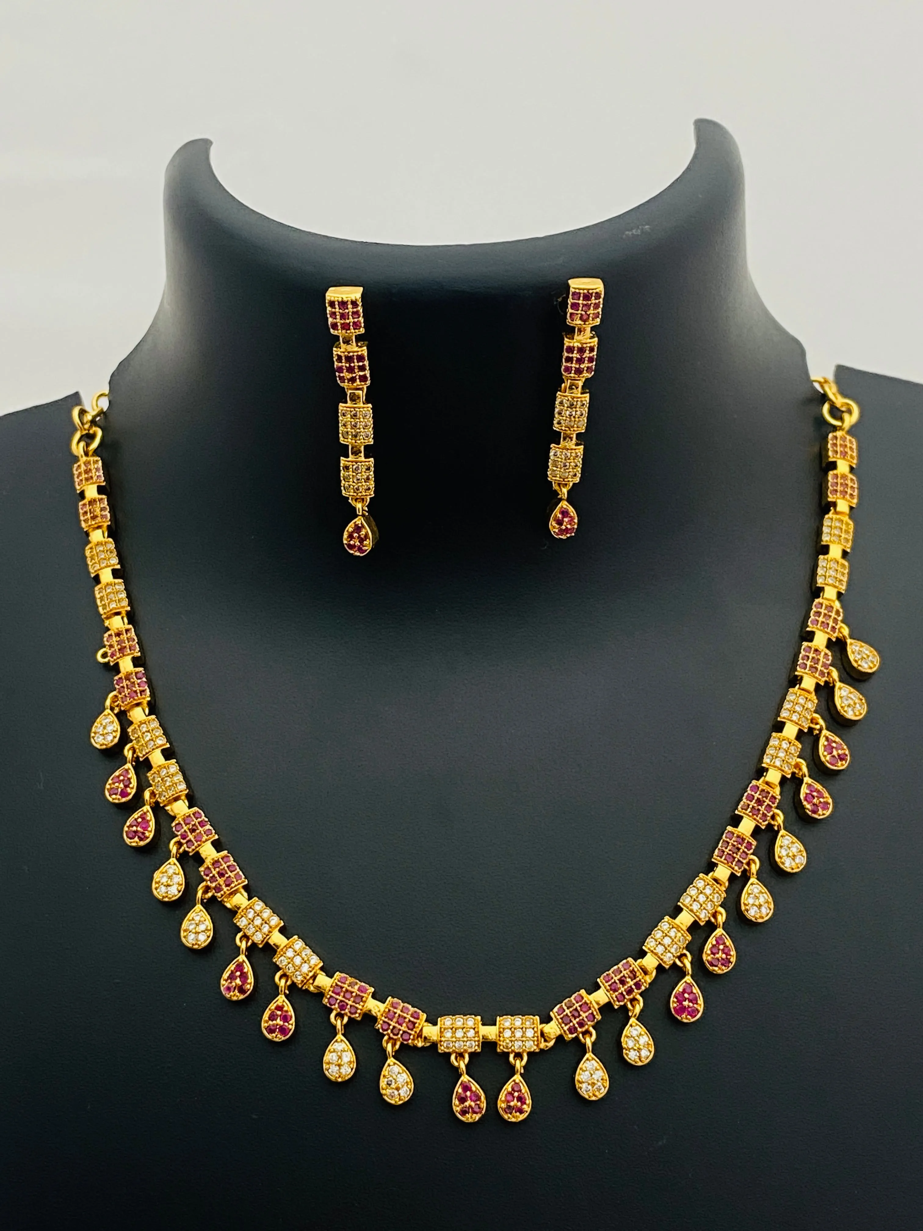 Lovely Gold Plated Ruby And White Colored Necklace With Earrings